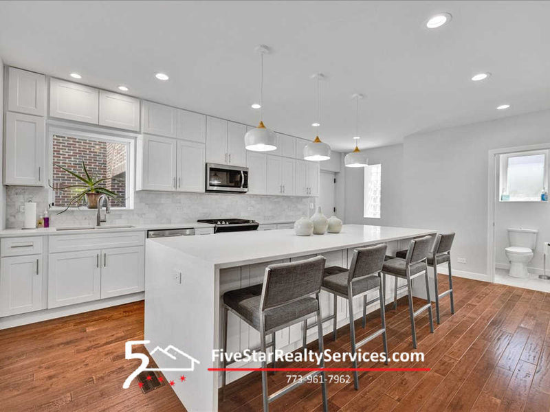 5 Bed 5 1/2 Bath  |  7439 W Lunt  |   Edison Park